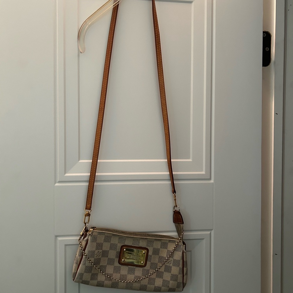 100% Authentic Louis Vuitton “Eva” Crossbody Bag.